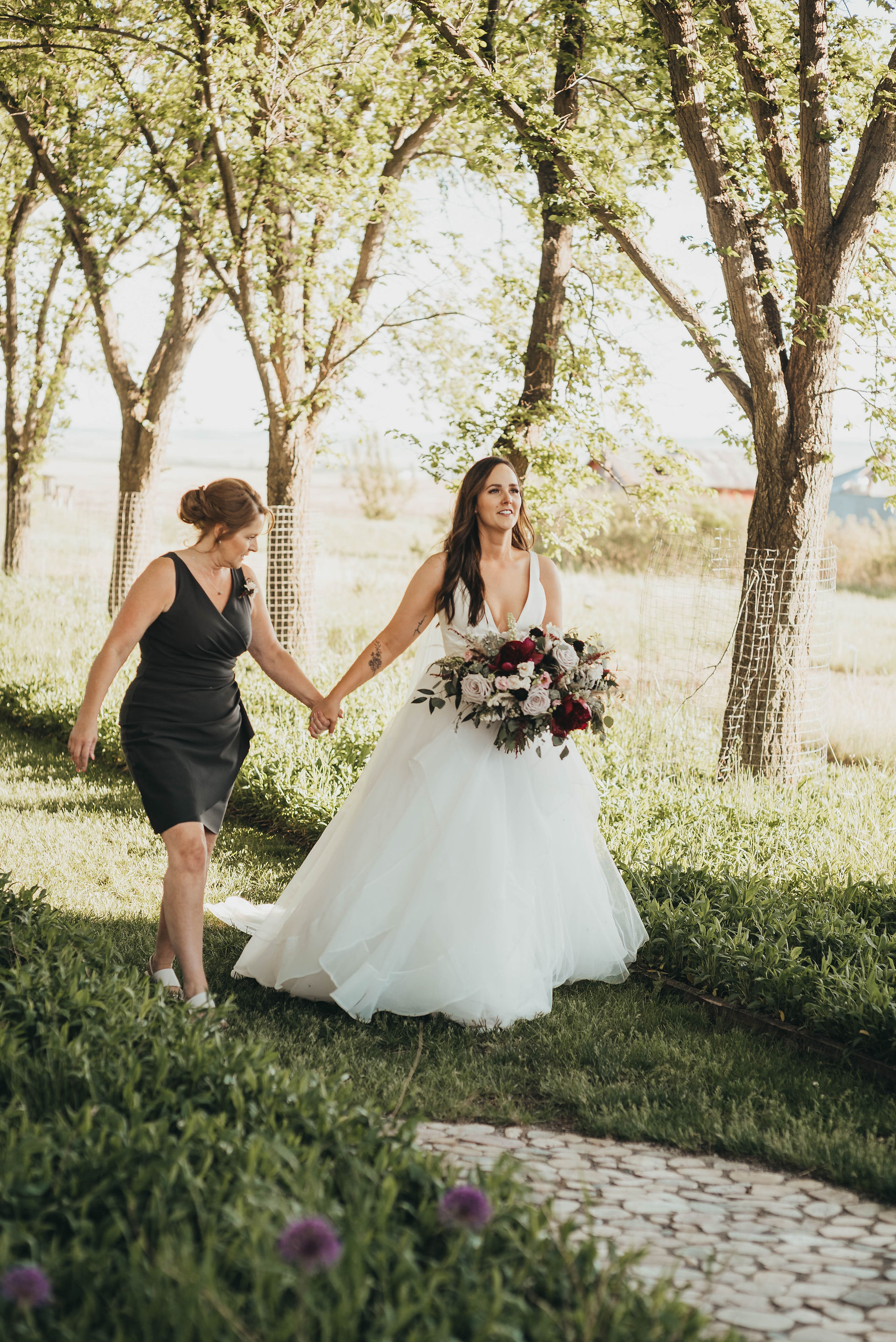 Mom walks bride down the isle.