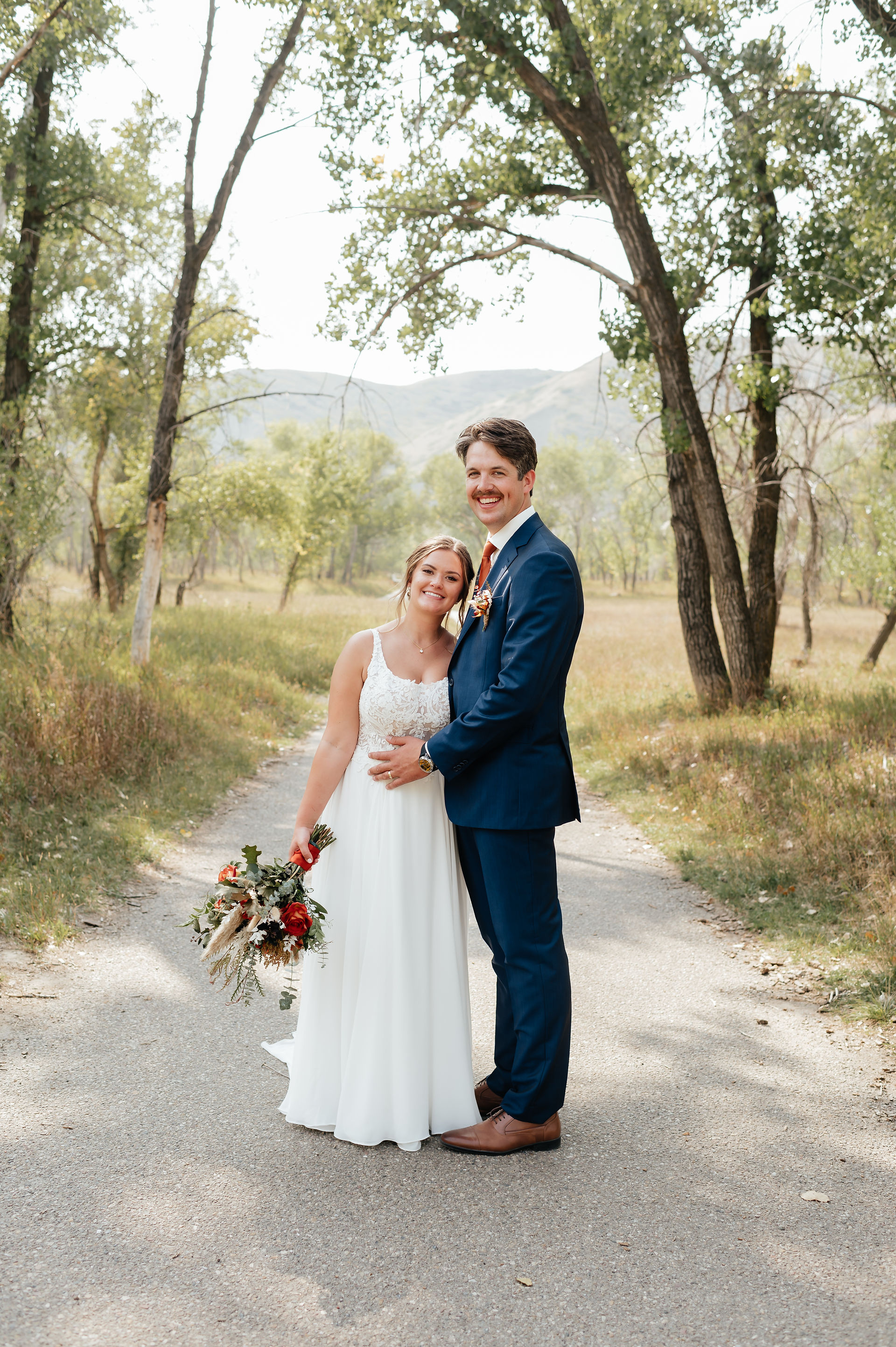 bride and groom in Lethbridge Alberta at Indian Battle Park  