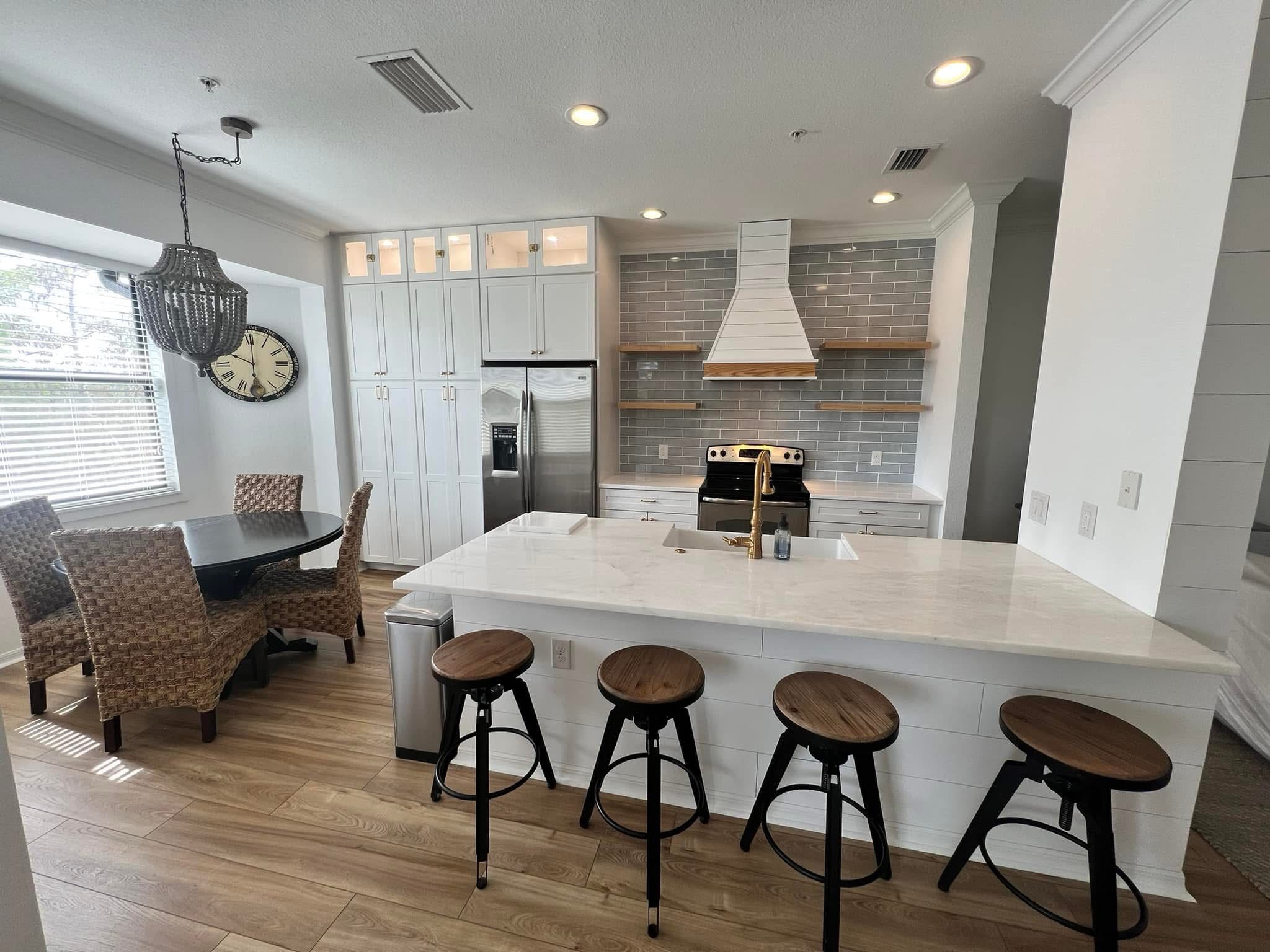 Renovated kitchen, Naples area home by Coastal Custom Homes SWFL