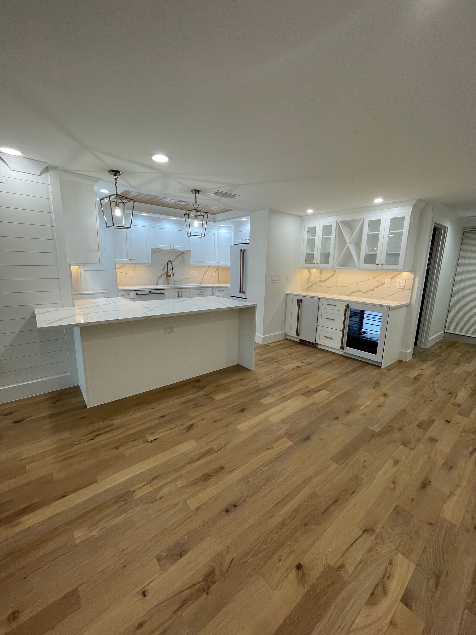 Renovated kitchen, Naples area home by Coastal Custom Homes SWFL