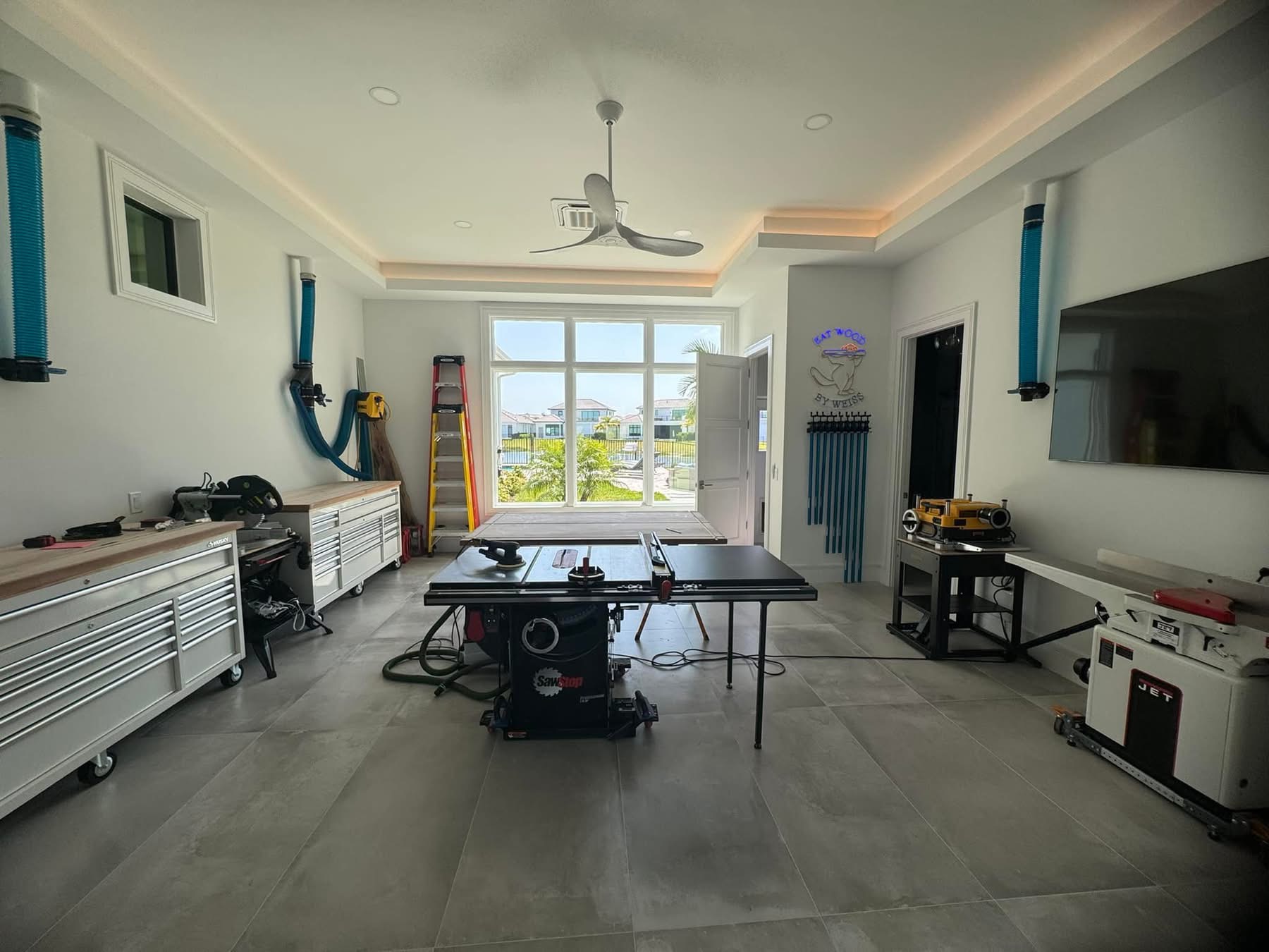 Living and dining area, Naples area home by Coastal Custom Homes SWFL