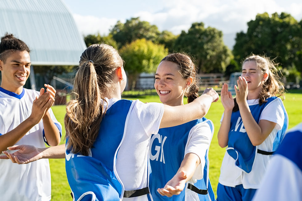 smiling-teammates-hug-after-a-game-on-the-field-2026-01-07-00-23-11-utc.jpg