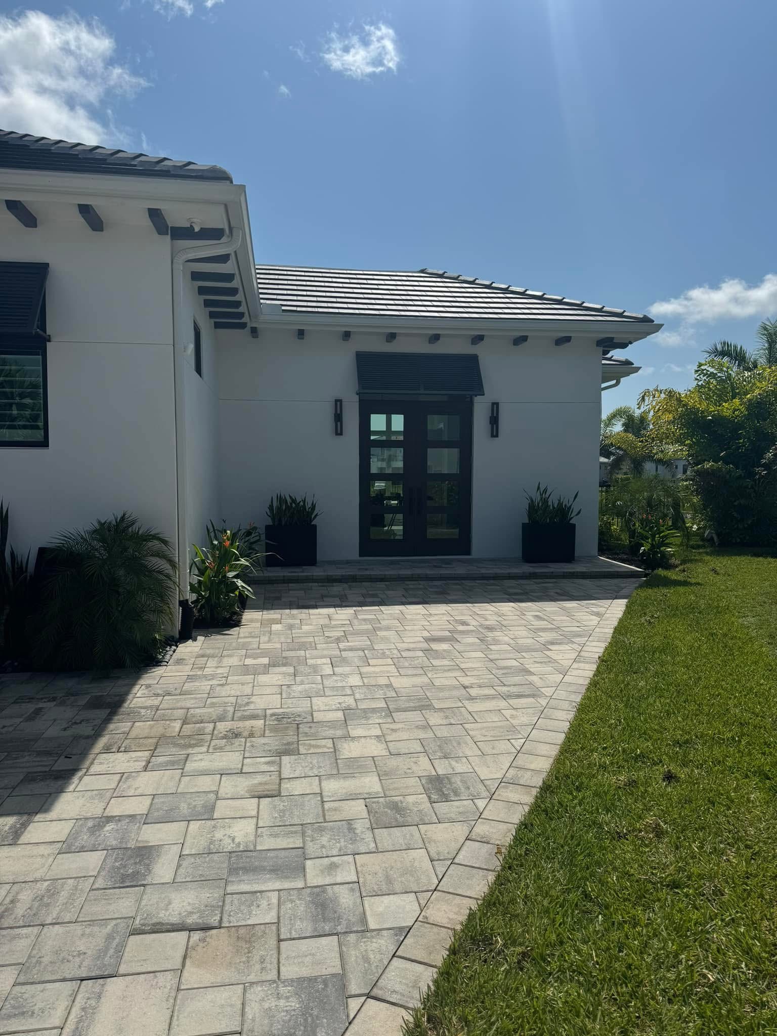 Home addition exterior, Naples area home by Coastal Custom Homes SWFL