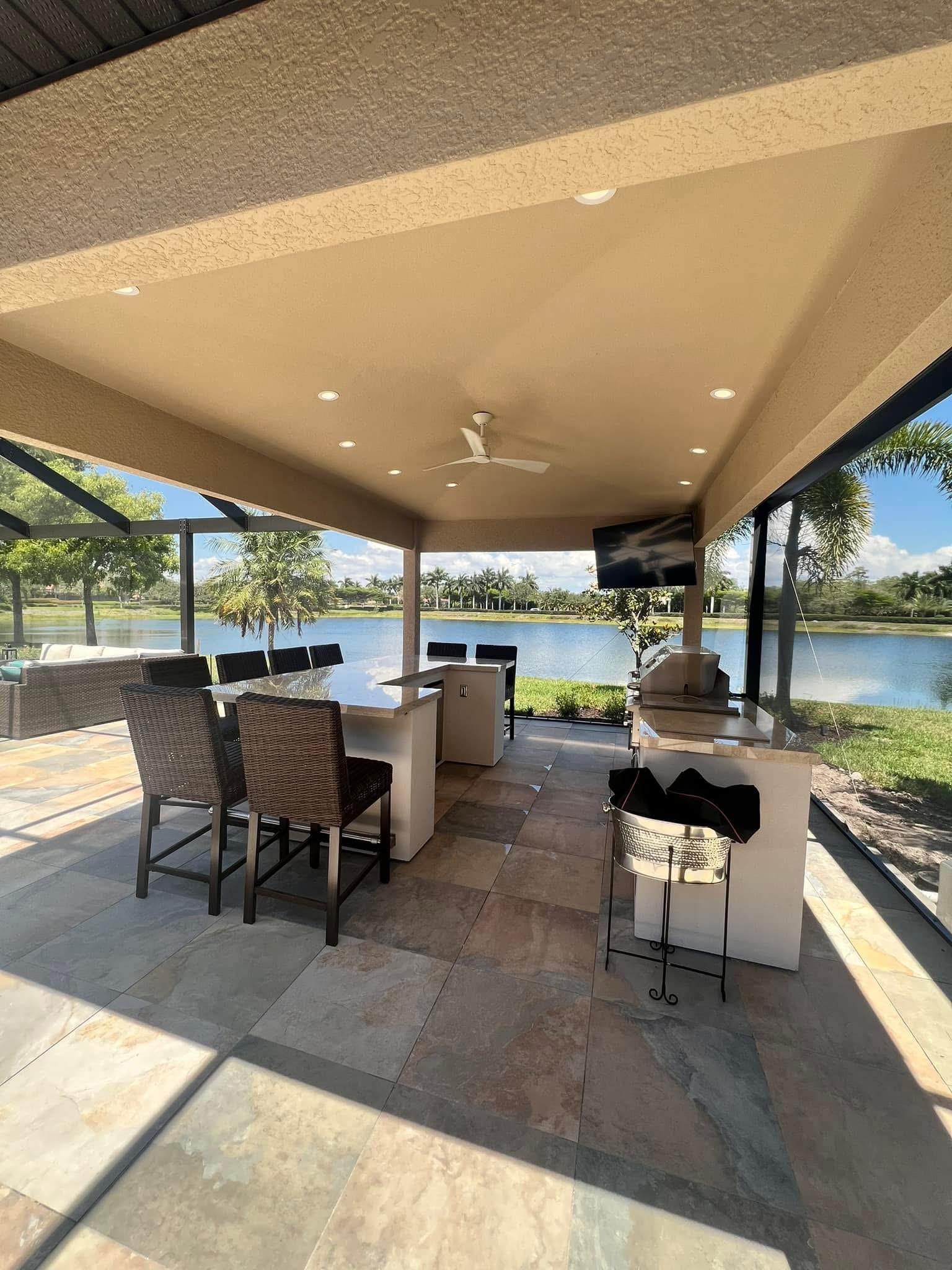 Covered lanai and outdoor living, Naples area home by Coastal Custom Homes SWFL