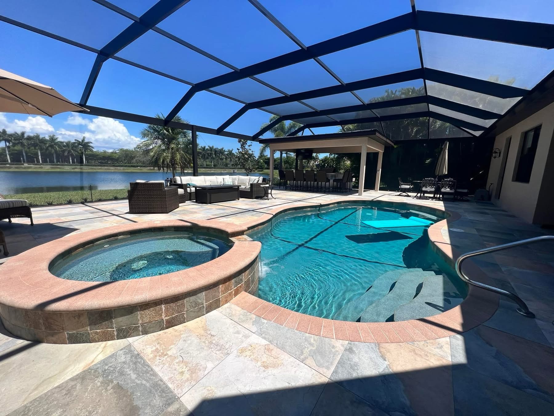 Pool and screened lanai, Naples area home by Coastal Custom Homes SWFL