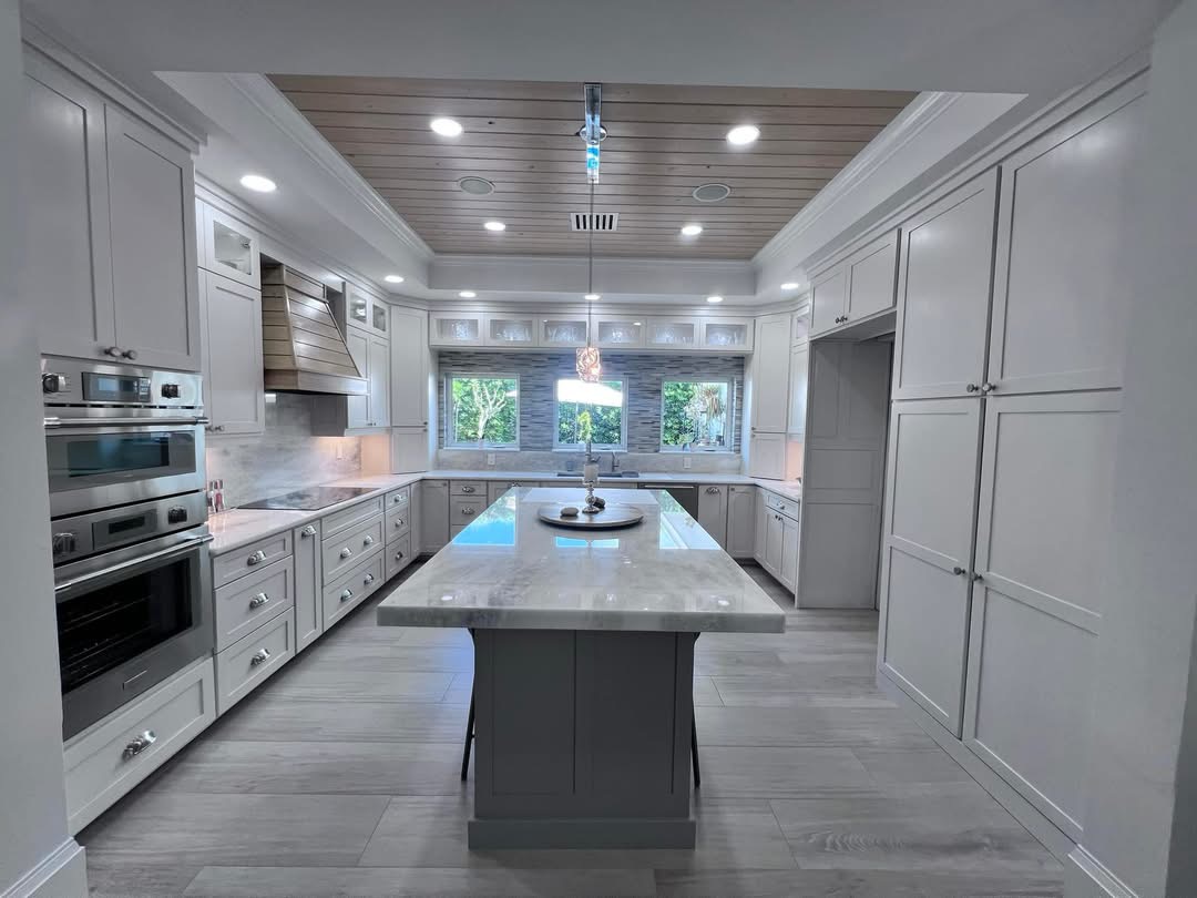 Renovated kitchen, Naples area home by Coastal Custom Homes SWFL