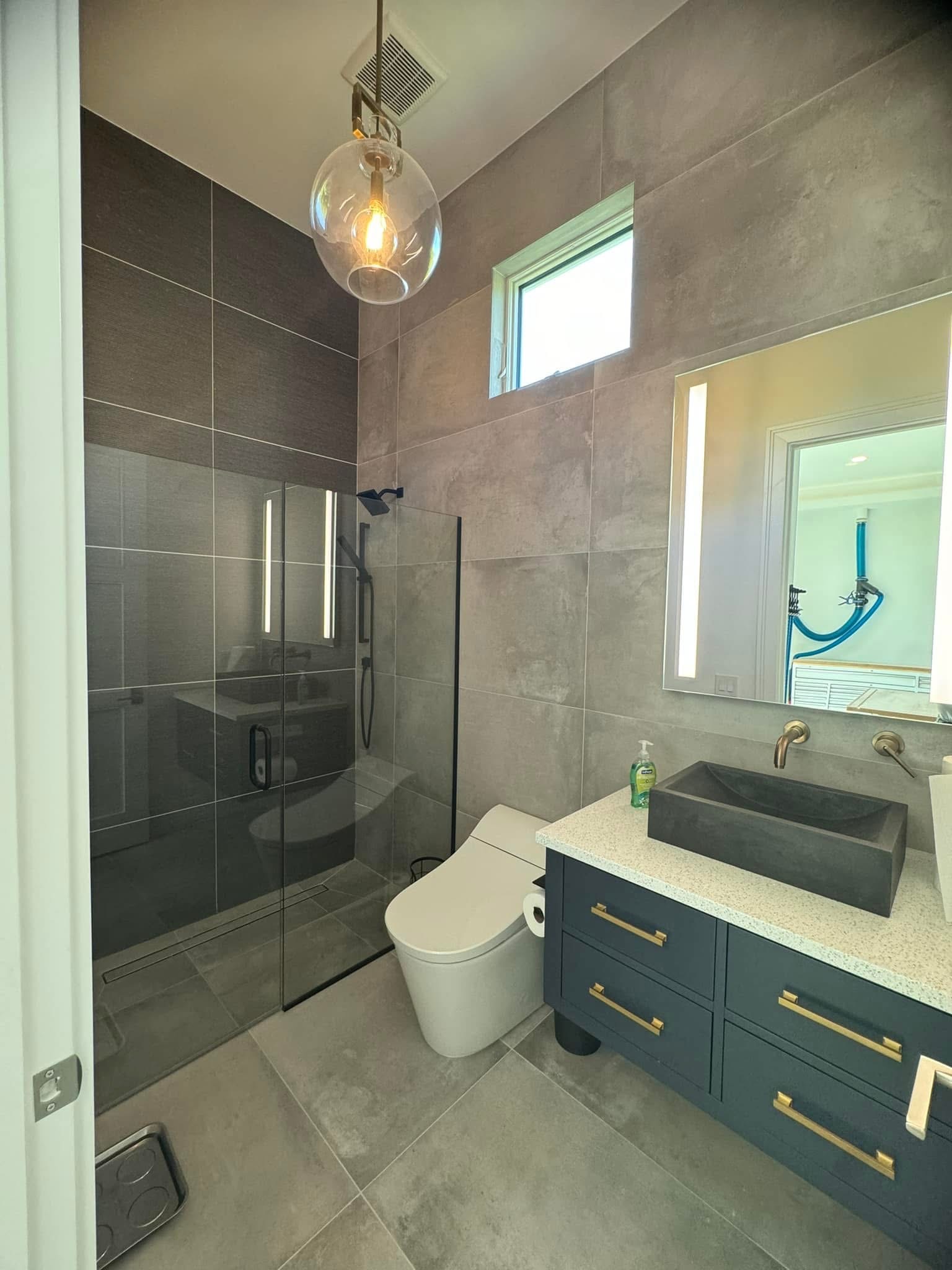 Renovated bathroom, Naples area home by Coastal Custom Homes SWFL