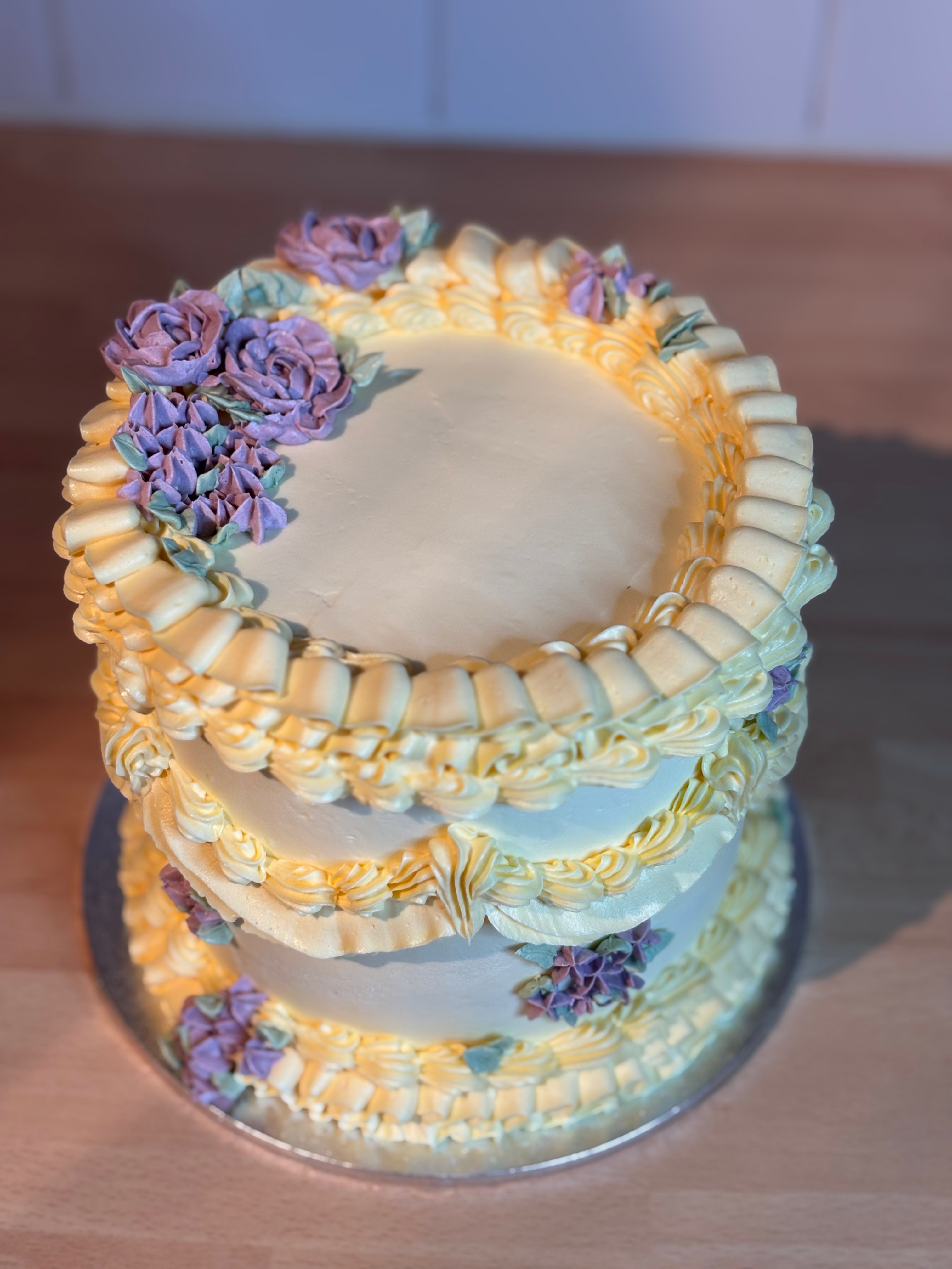 buttercream flowers on a vintage cake