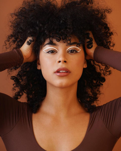 graphic white eyeliner for editorial photoshoot by Los Angeles makeup artist