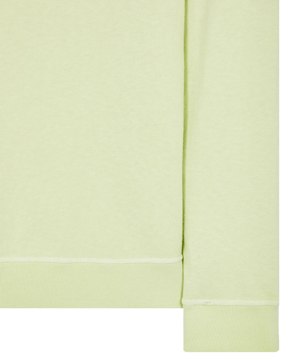 Miniature : Close-up of a light green garment, 535B9 Polo en Maille, showing the texture and seams.