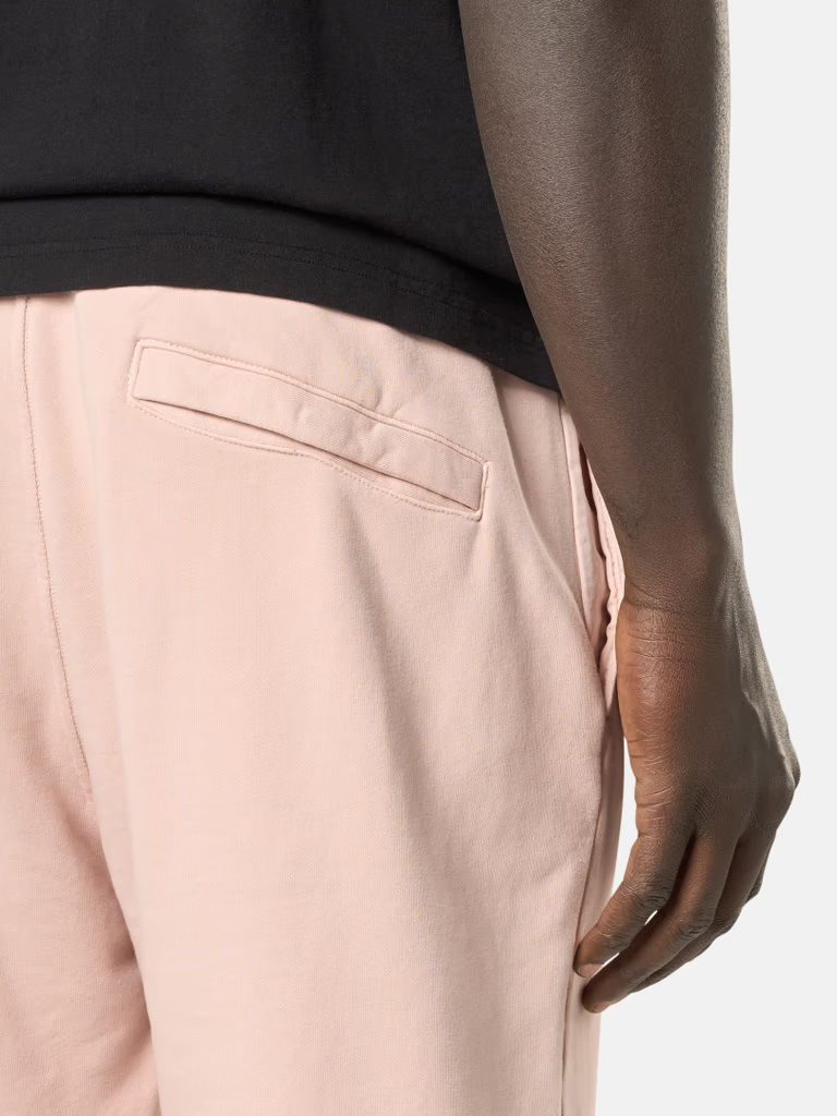 Miniature : Gros plan d'une poche de pantalon rose. Boutique Karsenty.