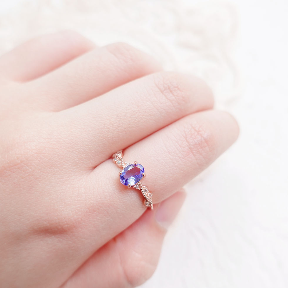 Thumbnail: Wave Tanzanite Ring