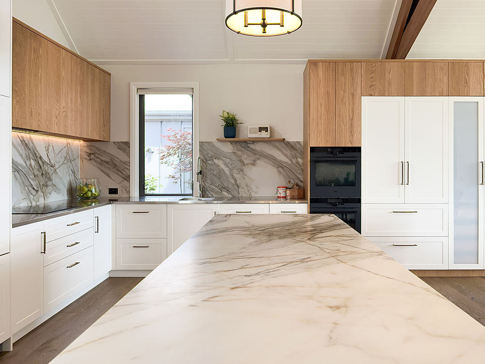 Feature stone kitchen island in this refined kitchen in Wanaka.