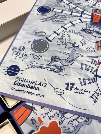Illustrated map of the Chemnitz-Hilbersdorf railway station in Lengnfeld, showing station details. Image from a board game, a product dummy that we handcrafted. Digital print on foil and paper.