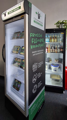 Refrigerator with large advertising sticker for fresh meat