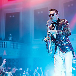 Lewis McCallum playing the saxaphone