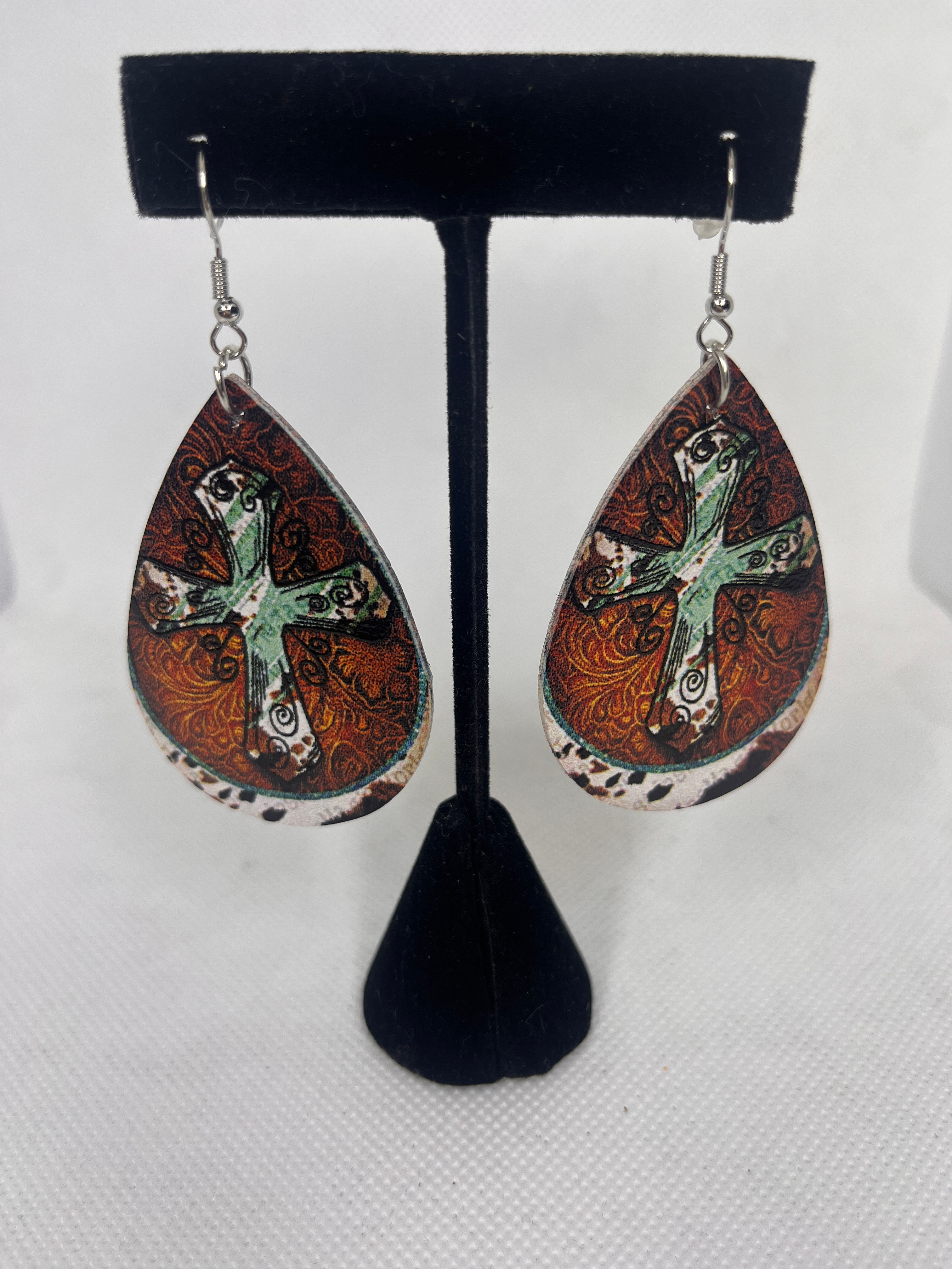 Teardrop shaped vintage distressed cross earrings