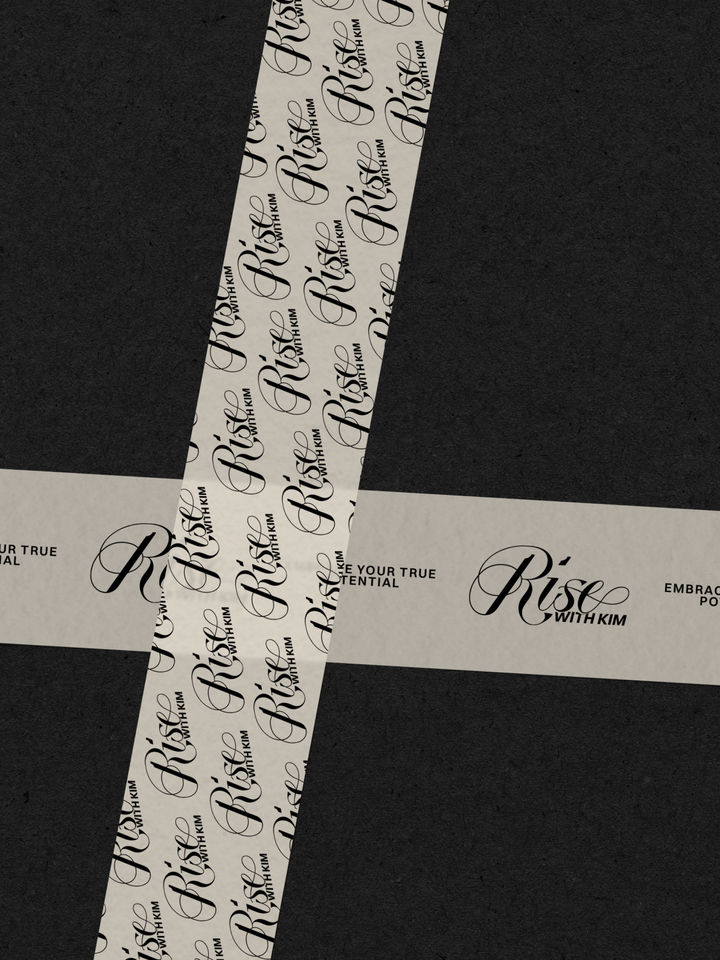 Kraft tape with Rise with Kim wellness brand logo — brand collateral design by White Stone Atelier
