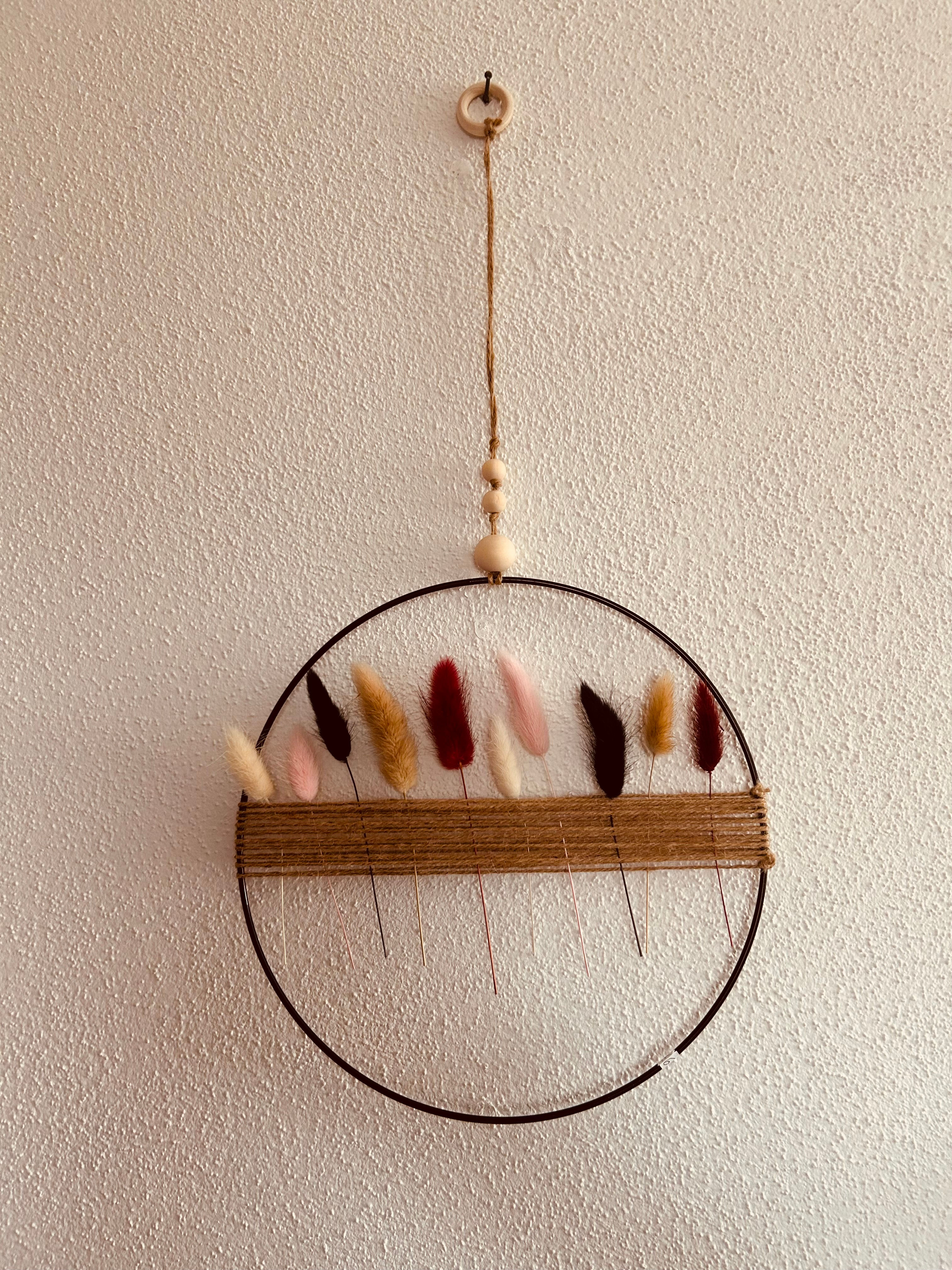 Loop hängend mit Blumen