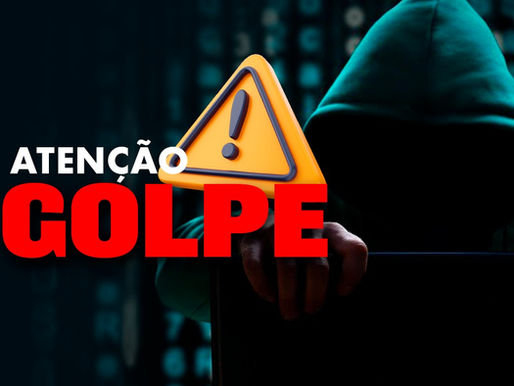 Figura encapuzada em fundo escuro digitando. Texto em destaque: "ATENÇÃO GOLPE" com símbolo de alerta. Atmosfera de cautela.