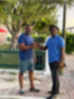 Nickson Dickenson (left) share a photo moment with Makhi Butterfield