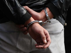 Man in Custody After Firearm and Ammunition Find