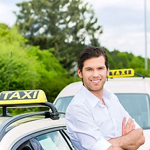 A picture of a lorry driver in his cab