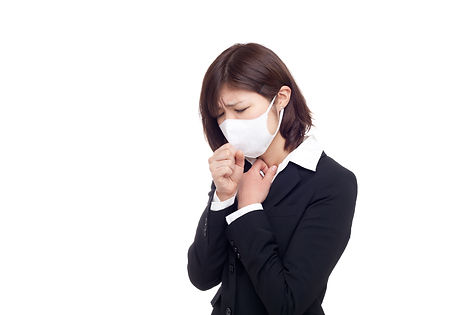 体調の悪い女性