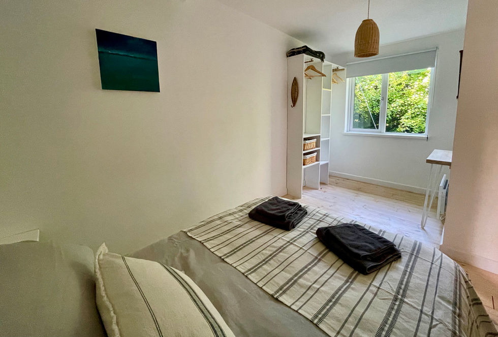 Double bedroom with soft french linen bedding
