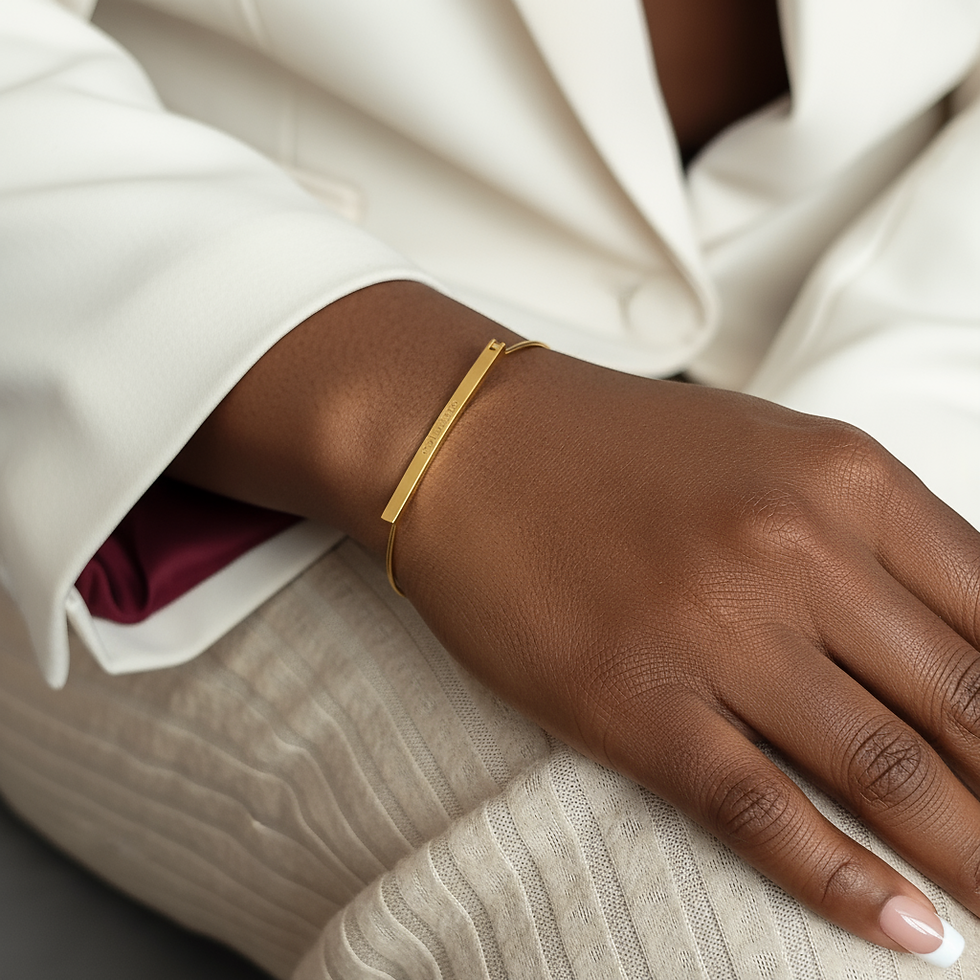 Miniature : Bracelet worn on wrist resting on lap, showing how the gold bar sits flat and the chain follows the curve of the wrist