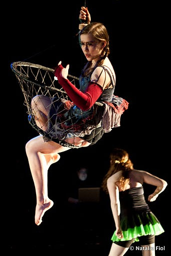 Kamilla Gray Kinard swinging from a fishing net at the Krannert Center for the Performing Arts in Urbana, IL