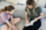 speech pathologist helps a child