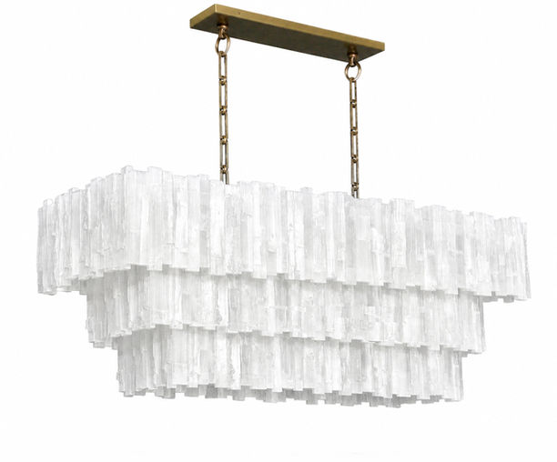 Three-tier rectangular selenite chandelier handcrafted from natural selenite crystal rods and suspended from a burnished brass canopy and chain. The layered design creates a cascading architectural silhouette while diffusing a warm ambient glow through the translucent mineral.