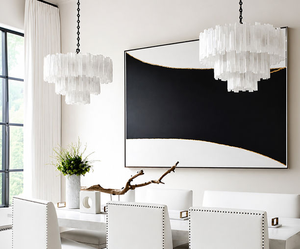 Three-tier round selenite chandelier handcrafted from natural selenite crystal rods arranged in concentric circular tiers. The illuminated fixture creates a soft, radiant glow while showcasing the organic translucency and layered texture of genuine selenite. Shown in a dining room.