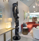 Hand-carved organic shape wood totems. Unique sculptures made from wood, featuring flowing, natural forms each piece emphasizes a sense of fluid motion and natural harmony.