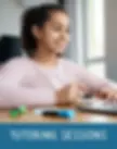 Middle school girl smiling during tutoring.webp