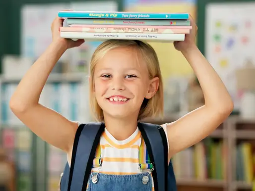 Girl hoding books