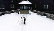couple posing for photo on a winter wedding