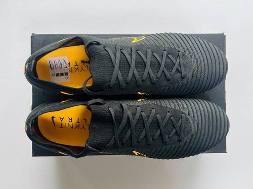 nike flyknit boots black and gold