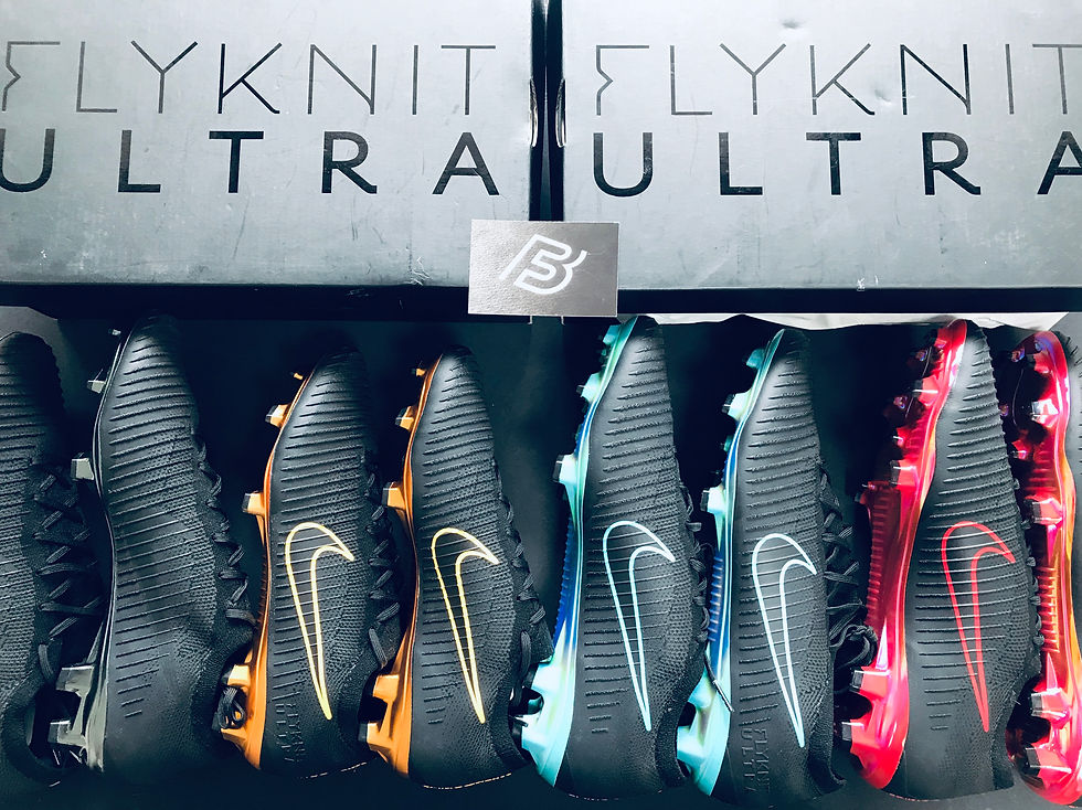 Close-up view of authentic deadstock football boots in original packaging