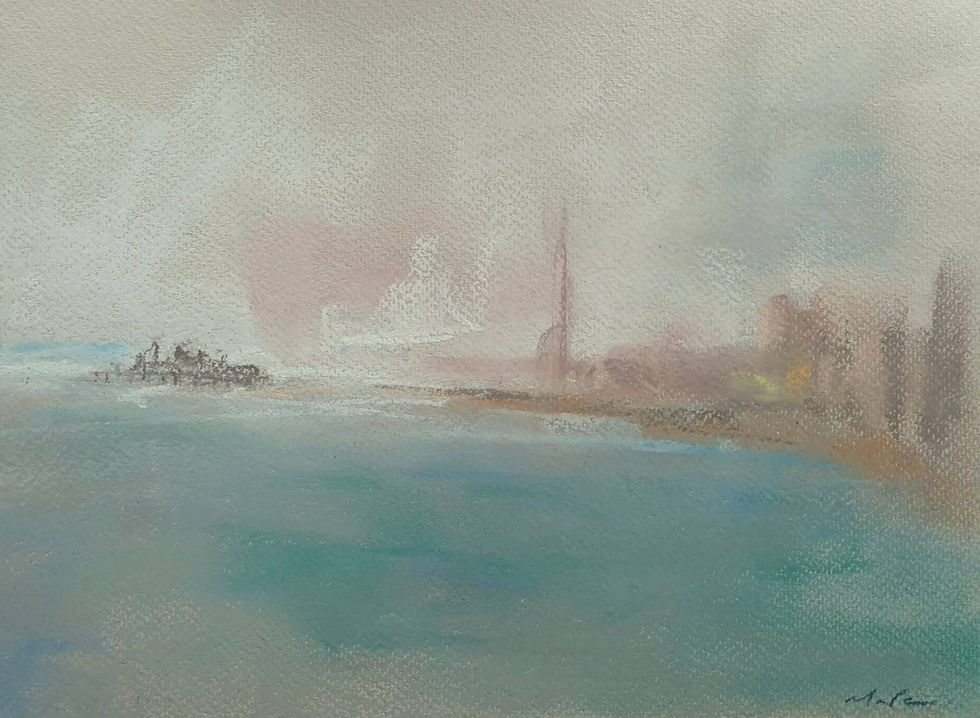 Misty coastal view with a distant pier and soft, muted colors over the water.