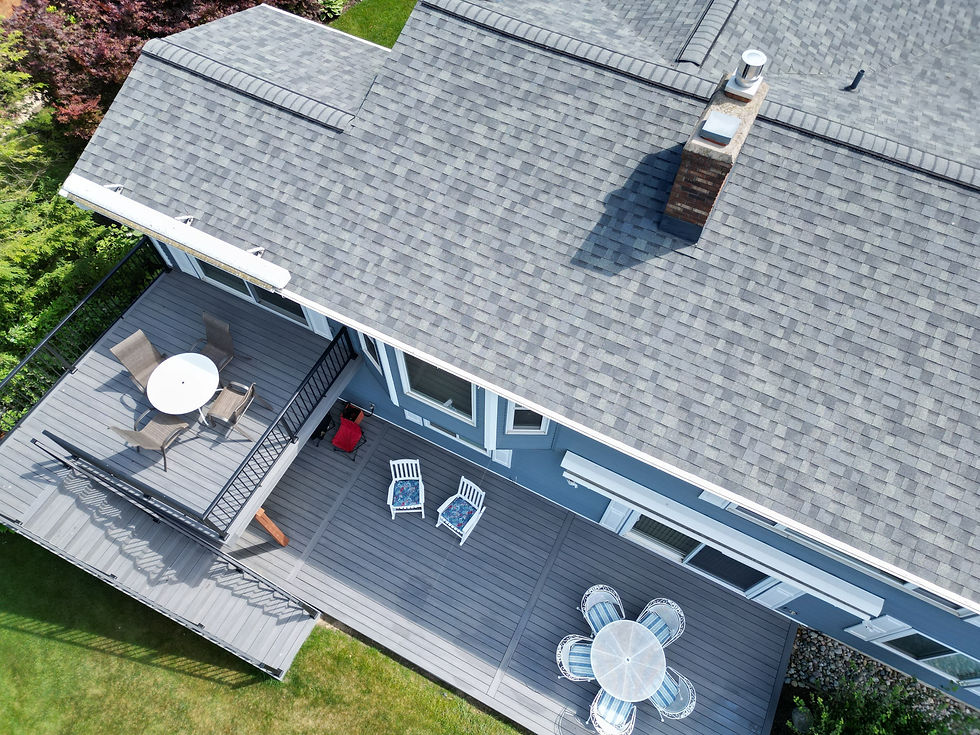 Blue house with Gray multi-story deck design
