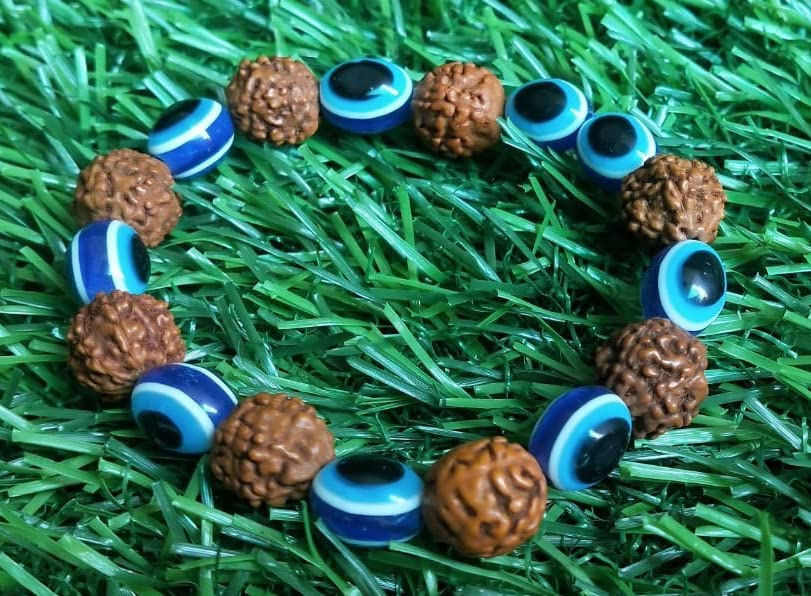 Thumbnail: Salvus APP SOLUTIONS Nazar Battu Rudraksha Bracelet, 2 pcs (Brown & Blue_3 inch)