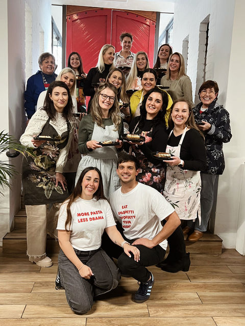 Sofia and Francesco with the ladies from the cooking class in Cape Town, South Africa