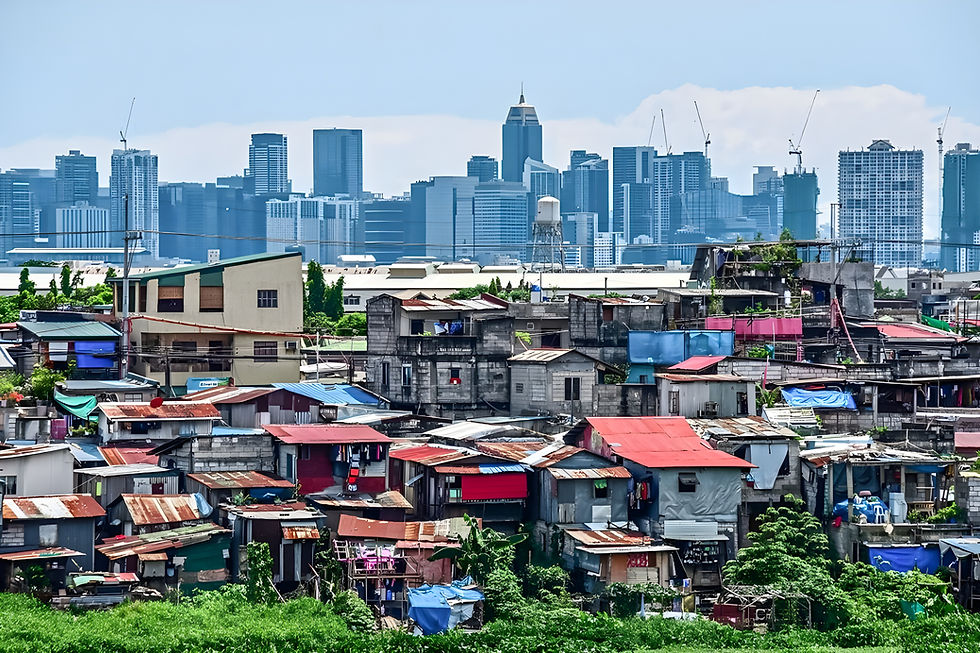 metro manila with province and shacks in foreground