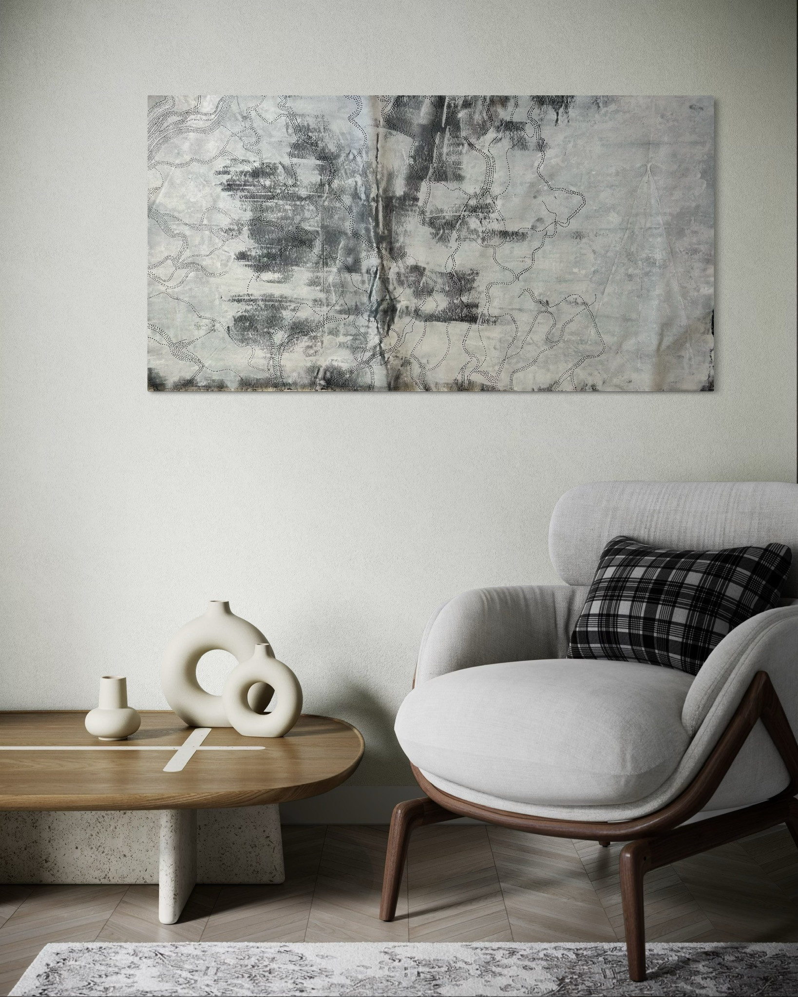 grande toile de couleurs noir, blanc, gris dans un salon