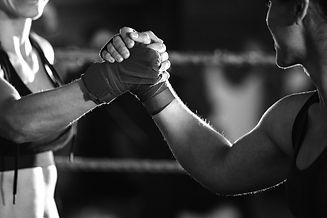 two-female-boxers-greeting-each-other-in-the-ring-2025-04-03-05-09-29-utc_edited.jpg
