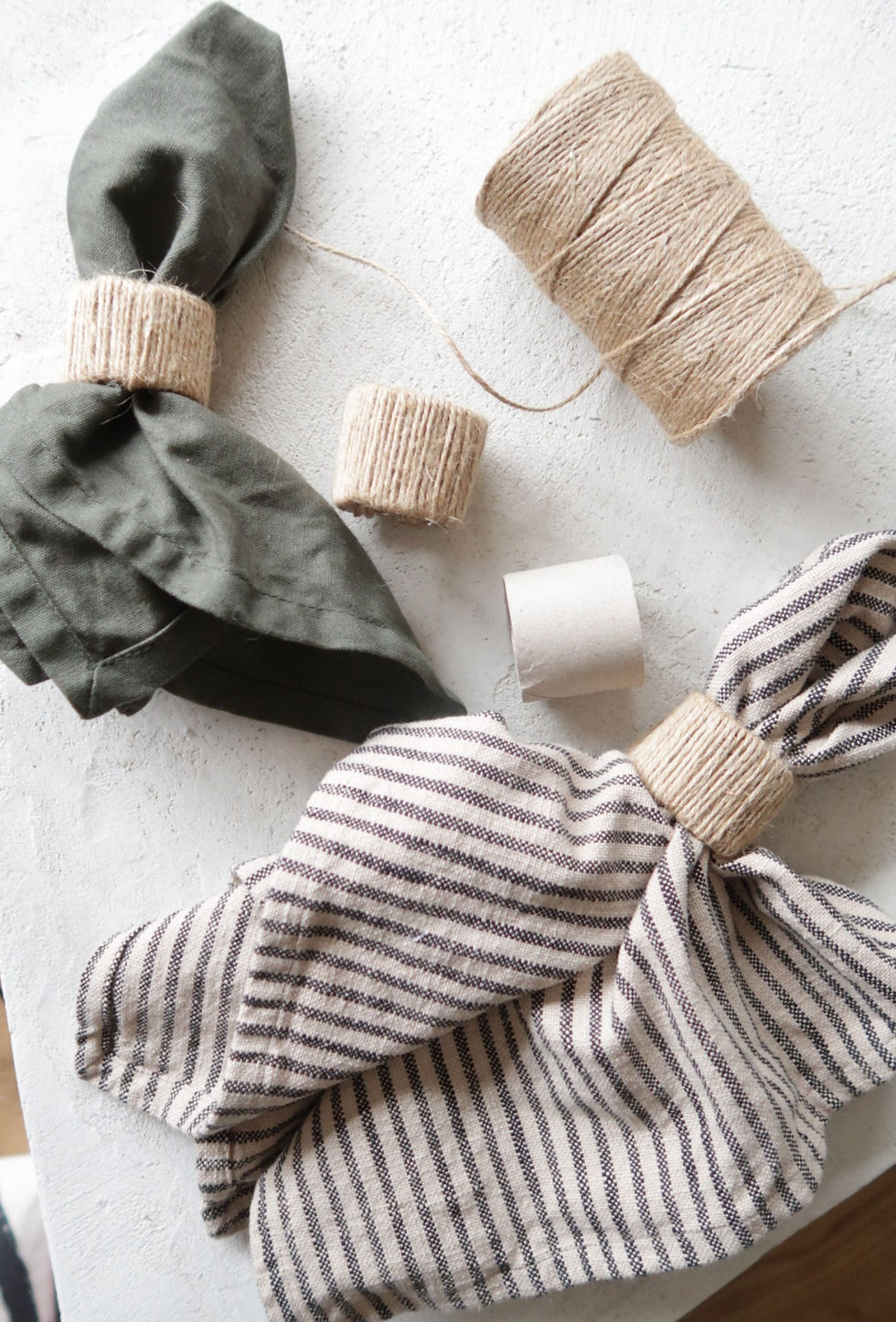 natural linen napkins with rustic string napkin rings DIY decorations made by Claire Douglas