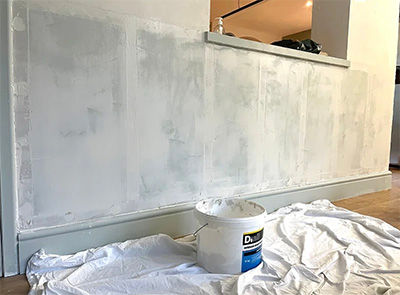 A skim coat applied to an internal wall