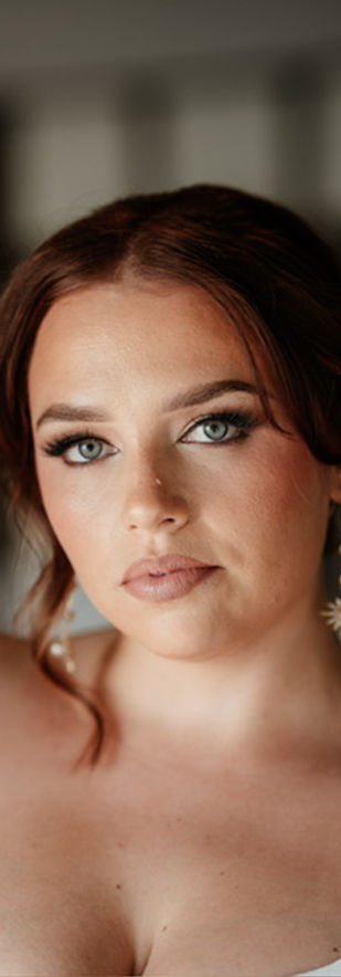 beautiful image of bride with full nude lips and stunning feline smoky eyes